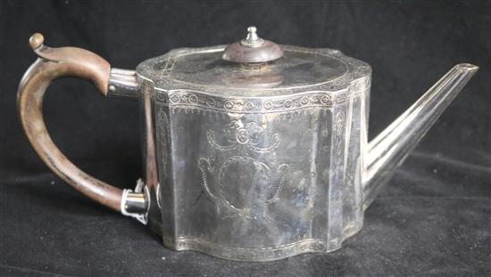 A George III silver shaped oval teapot by William Plummer, London, 1779, gross 11 oz.